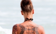 Tatuiruota mergina (7 nuotraukos)
