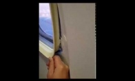 Nesandarus lėktuvo langas