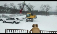 Mašina, nupučianti sniegą nuo automobilių